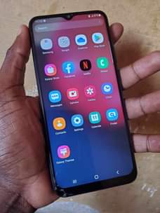 A picture of Samsung A12 Storage64 Ram4 Network4G Finger print pemben Camela zoote