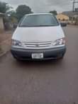 A picture of Toyota sienna 2000 model for sale Super clean body Sound