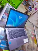 A picture of Asus laptop 12 generation 8gb Intel cerelon 256gb 12gen 700000