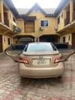 A picture of Sharp first body 2008 Toyota Camry sound four plugs engine