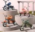 A picture of Kids bicycle and other toys