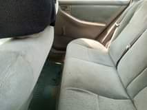 A picture of with 2 1m this 2004 toyota corolla with Partial 1st
