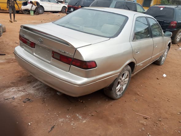 A picture of AWOOF GIVEAWAY Registered Toyota Camry Tiny light with tapping engine
