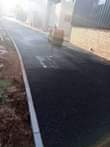 A picture of Tar surfacing and brick paving