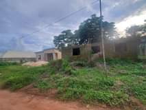A picture of 100 by 100 land off airport rd benin city edo