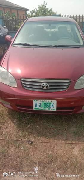 A picture of Christmas Deal Sharp Red Toyota Corolla 2005 First Body Engine