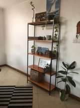 A picture of Iron wooden shelves