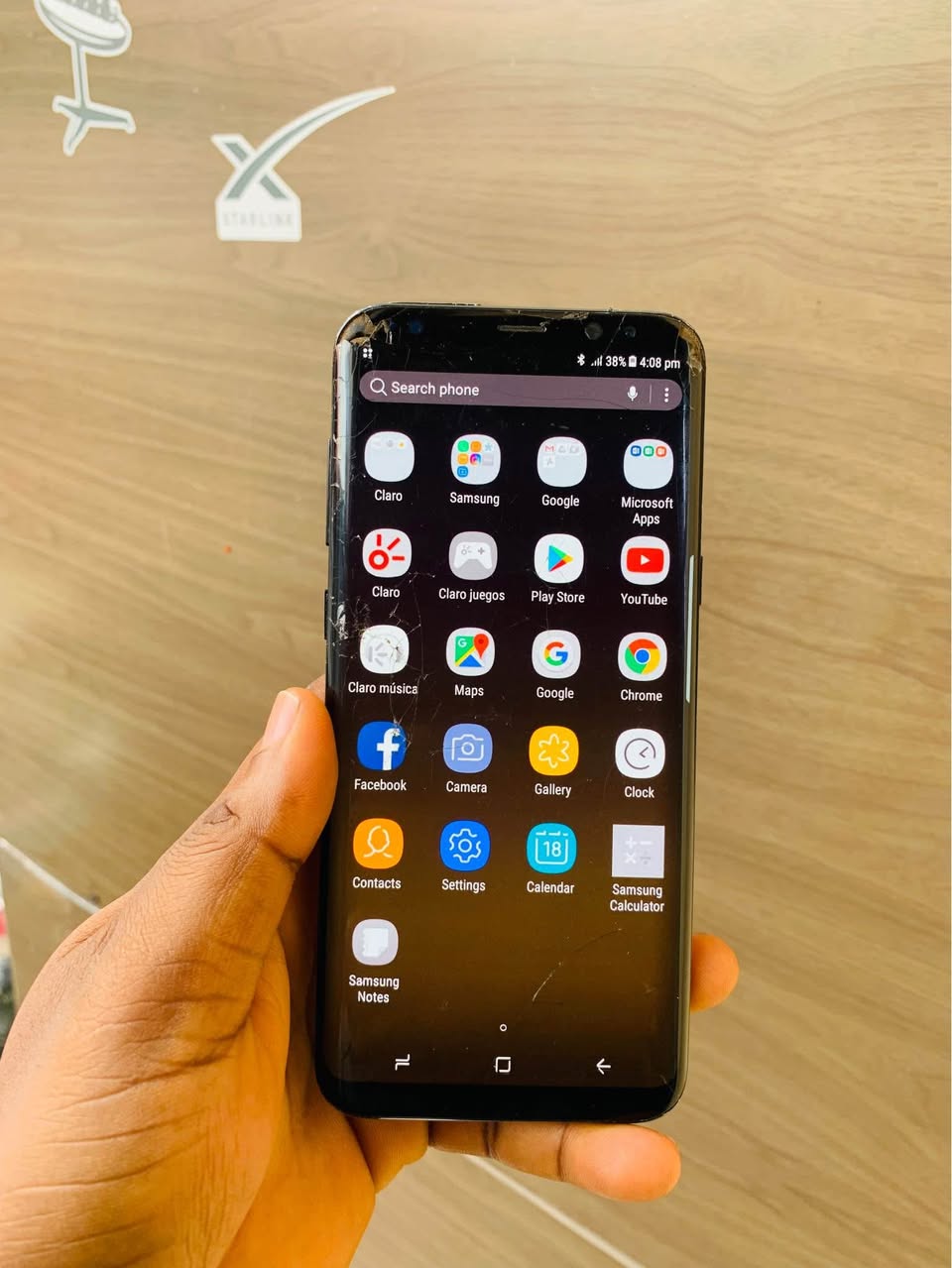 A picture of Samsung S8 plus cracked screen going cheaper