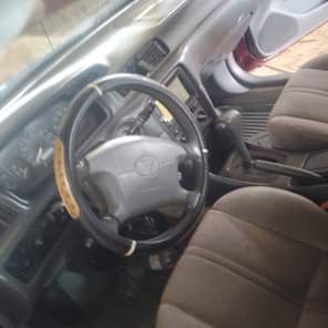 A picture of AWOOF AWOOF TOYOTA CAMRY 2000 Engine Gear Ac needs attention