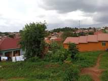 A picture of Kawanda kawempe bombo rd plot on quick sale