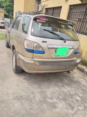 A picture of Lexus RX 300 2000 model Buy and drive Body needs