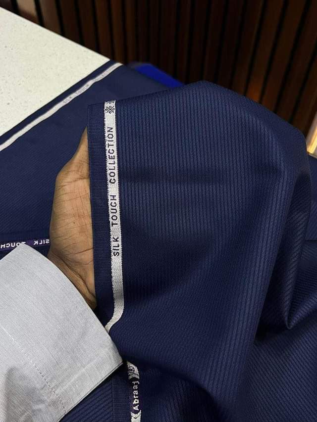 A picture of ABRAJ WOOL N5 500 PER YARD Call 09030685654 08172475948 Whatsapp