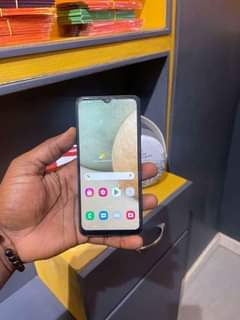 A picture of samsung A12 gb 64 ram 4gb very clean 260k 0682687320