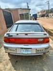 A picture of URGENT SALE Registered Mazda 323f auto drive 4lugs engine gear
