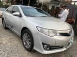 A picture of Toyota Camry 2014 Pure firstbody Clean in and out Toks