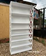 A picture of TV STANDS CENTRE TABLES DRESSING MIRRORS WARDROBES CUPBOARDS AND ALL