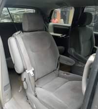 A picture of Clean Nigerian Used Grey Toyota Sienna 2005 Repainted Fabric interior