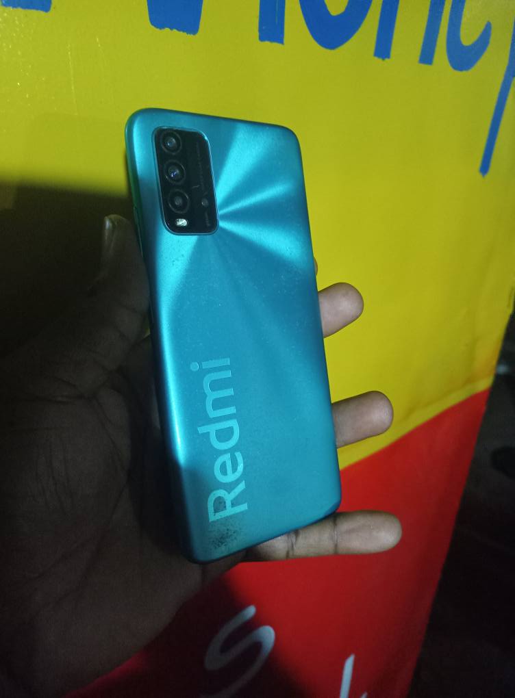 A picture of Redmi 9power 64gb 4gbram 6000Mah battery.has dent in the screen