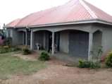 A picture of House with shops on quick sale