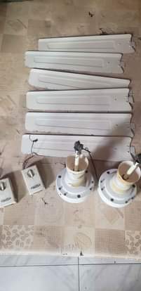 A picture of 2 Neatly used Newclime ceiling fan big coil