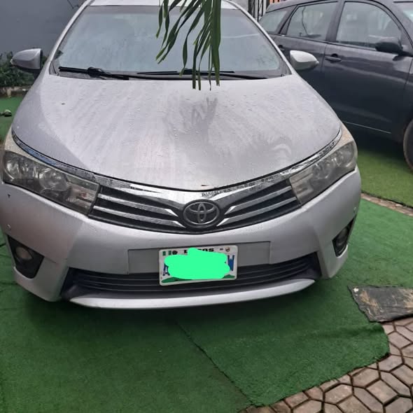 A picture of Toyota corolla 2015 everything is working perfectly 2025 on custom