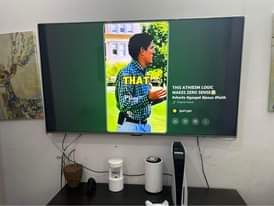 A picture of PS5 Gamepad and Skyworth TV 65 inch