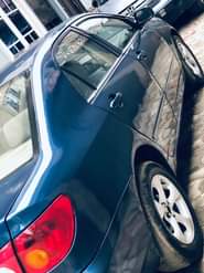A picture of Neatly used buy and drive Toyota Corolla with nothing to