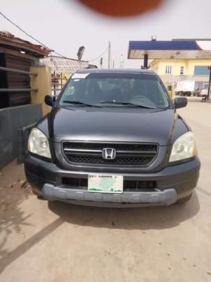 A picture of Toyota Camry 06 and Honda Pilot 06 for sale my