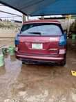A picture of 2005 Red Corolla Matrix Black