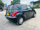 A picture of 2004 TOYOTA IST 0714058883 TOYOTA