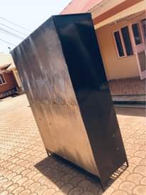 A picture of Am selling a metallic wardrobe 600k. I have used it