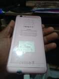 A picture of Oppo f1s 64gb 4ram.... Kuna mda kioo kinasheki alafu kinaacha