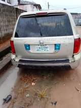 A picture of HONDA PILOT 2005 Engine Ac Gear Location festac Price 1