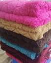A picture of New patched designed fluffy duvets with two pillowcases Sizes............5 6