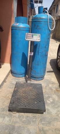 A picture of Two 50kg Cylinder and scale for sale