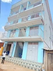 A picture of Am selling this commercial flat building of 3 floors in