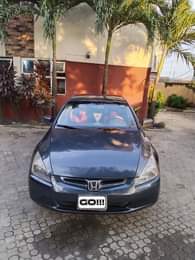A picture of HONDA ACCORD 2004 MODEL very clean and straight body good