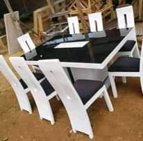 A picture of Sets of dinning center tables TV stand and other