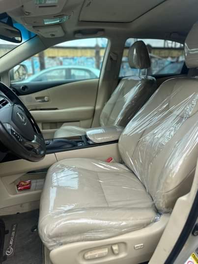 A picture of Tokunbo Lexus RX350 2015 model Clean leather interior Sound V6