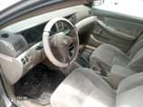 A picture of 2 Corollas for sale The wine is Tapping The other