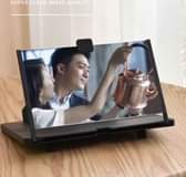A picture of Screen magnifier Enjoy kuangalia movie music video kwny simu yako