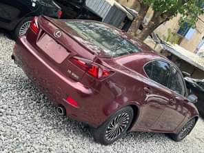 A picture of Extremely clean is250 Lexus full option red on nature Double
