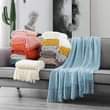 A picture of Enhance your living room or bedroom look with our throws