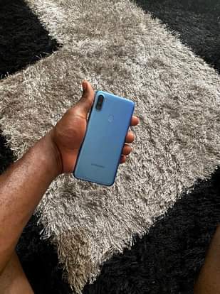 A picture of Samsung galaxy A11 32gb. Slight cracks but looking neat at