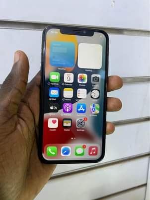 A picture of iPhone X 256gb faceid working 730k WhatsApp or call 0759979422