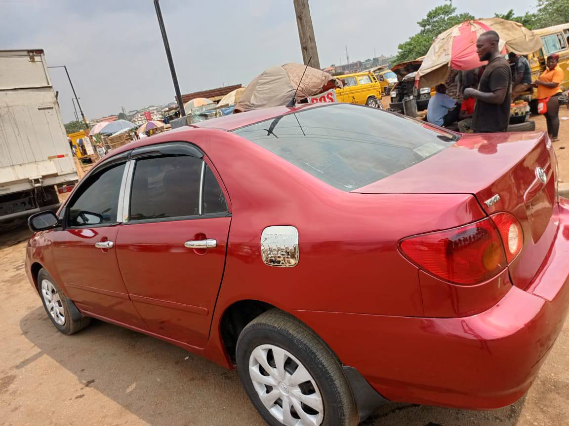 A picture of 2004 Toyota Corolla LE for sale price slashed Engine very