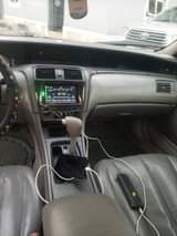 A picture of Sharp and clean Toyota Avalon dashbord 2004 model engine gear