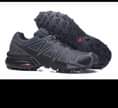 A picture of Salomon and Merrel hiking shoes