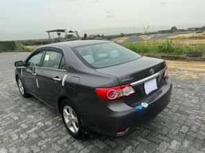 A picture of WOW This is premium standard Toyota Corolla 2013 model registered