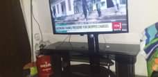 A picture of 43inch lg screen and tv stand with hoofer